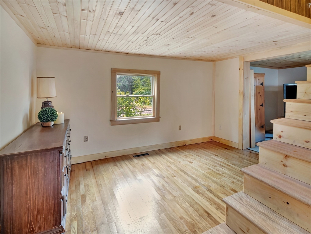 10 Ridge Road Norton, MA 02766 - Photo 21 of 34 a view of empty room with wooden floor
