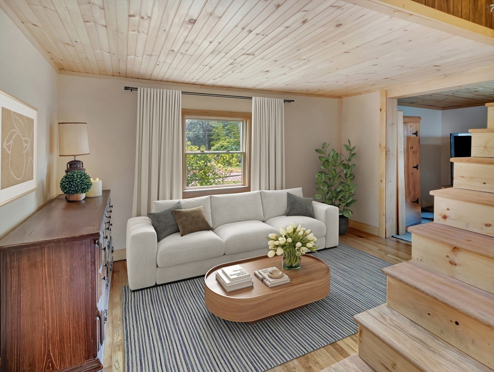 10 Ridge Road Norton, MA 02766 - Photo 22 of 34 a living room with furniture and a large window