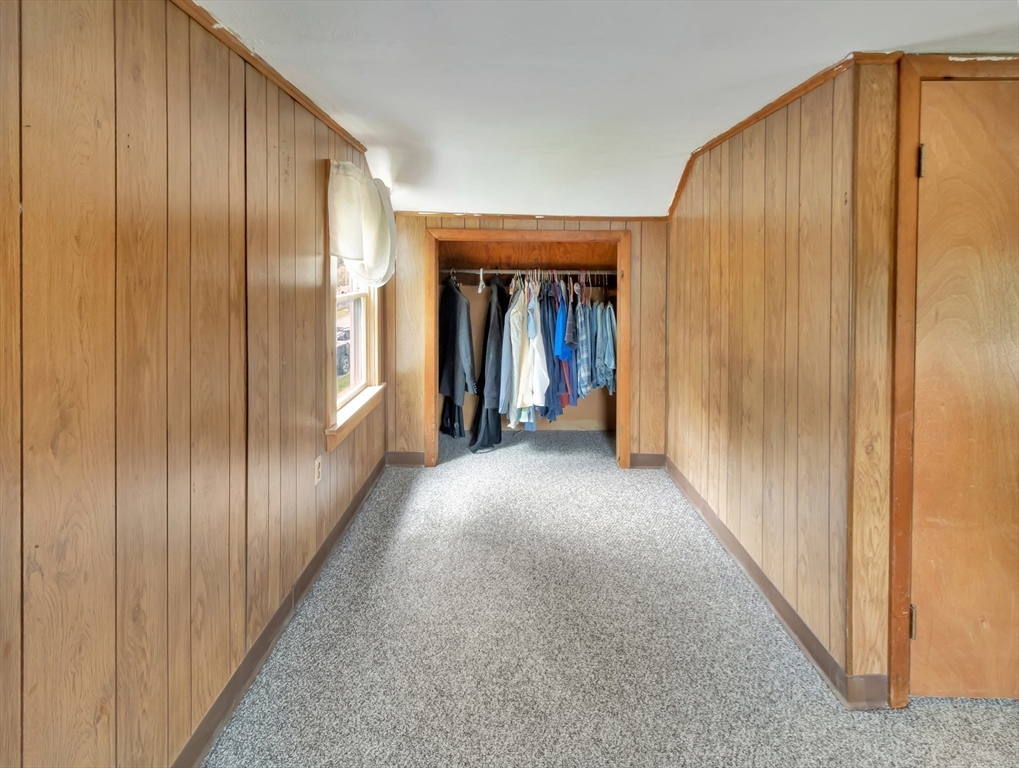 10 Ridge Road Norton, MA 02766 - Photo 24 of 34 a view of a hallway with wooden walls