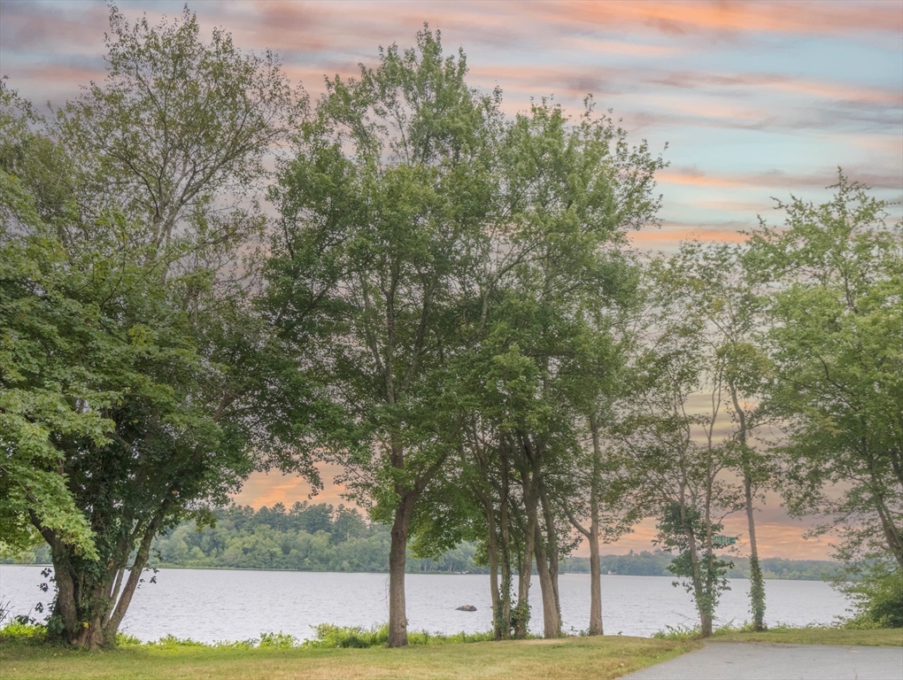 10 Ridge Road Norton, MA 02766 - Photo 30 of 34 a view of a yard with large trees