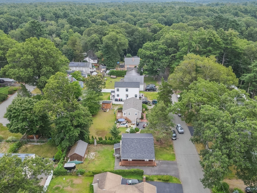 10 Ridge Road Norton, MA 02766 - Photo 32 of 34 an aerial view of residential houses with outdoor space and trees all around