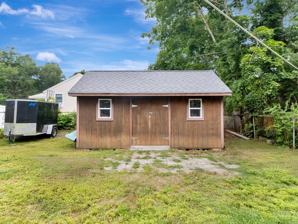 10 Ridge Road Norton, MA 02766 - Photo 4 of 34 a view of a house with a yard