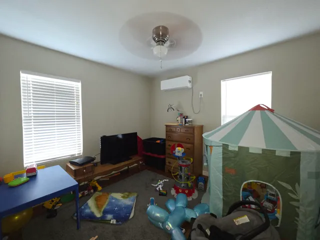 a workspace with furniture and a window