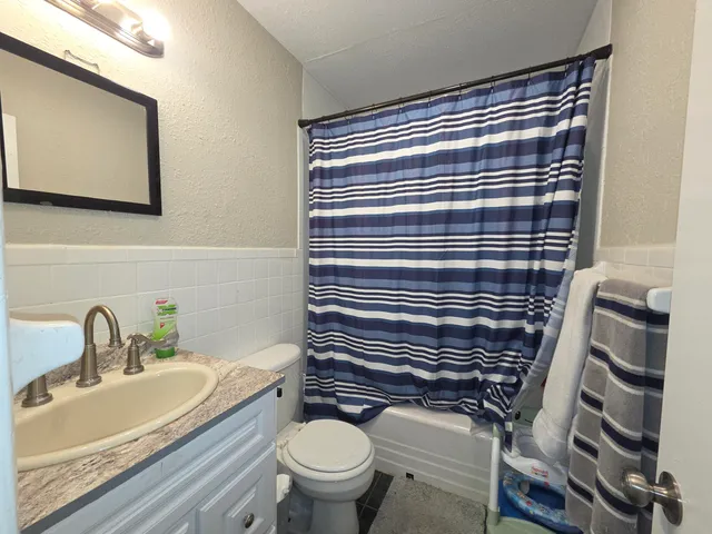 a bathroom with a sink and a toilet