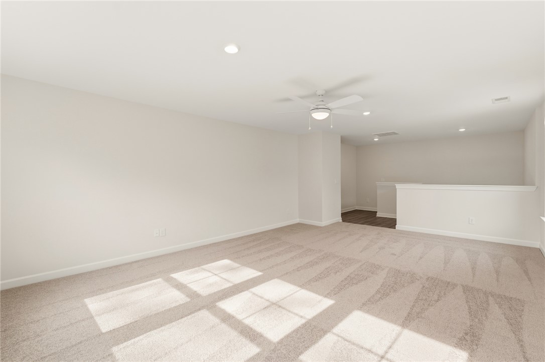 1108 Manse Jolly Road Anderson, SC 29621 - Photo 32 of 45 This spacious interior features inviting carpeting and convenient recessed lighting.