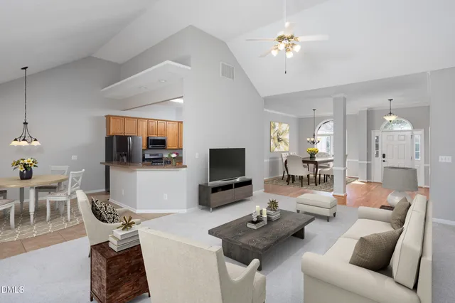 a view of a kitchen with a sink a cabinet and mirror