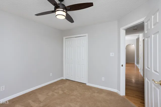 a bathroom with a sink a vanity and a bathtub