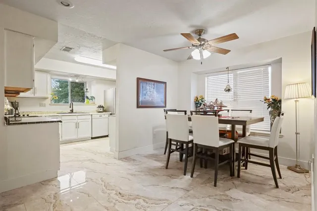 a view of a dining room with furniture
