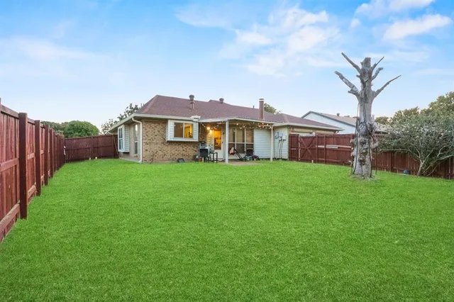 a bathroom with a sink vanity granite toilet and shower