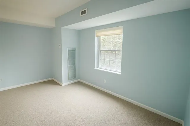 an empty room with a window