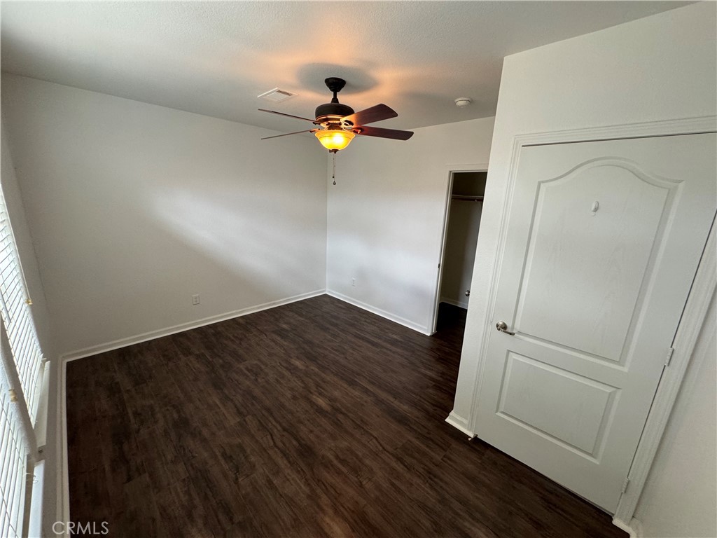 57725 Ramsey Road Anza, CA 92539 - Photo 18 of 43 a view of empty room with wooden floor