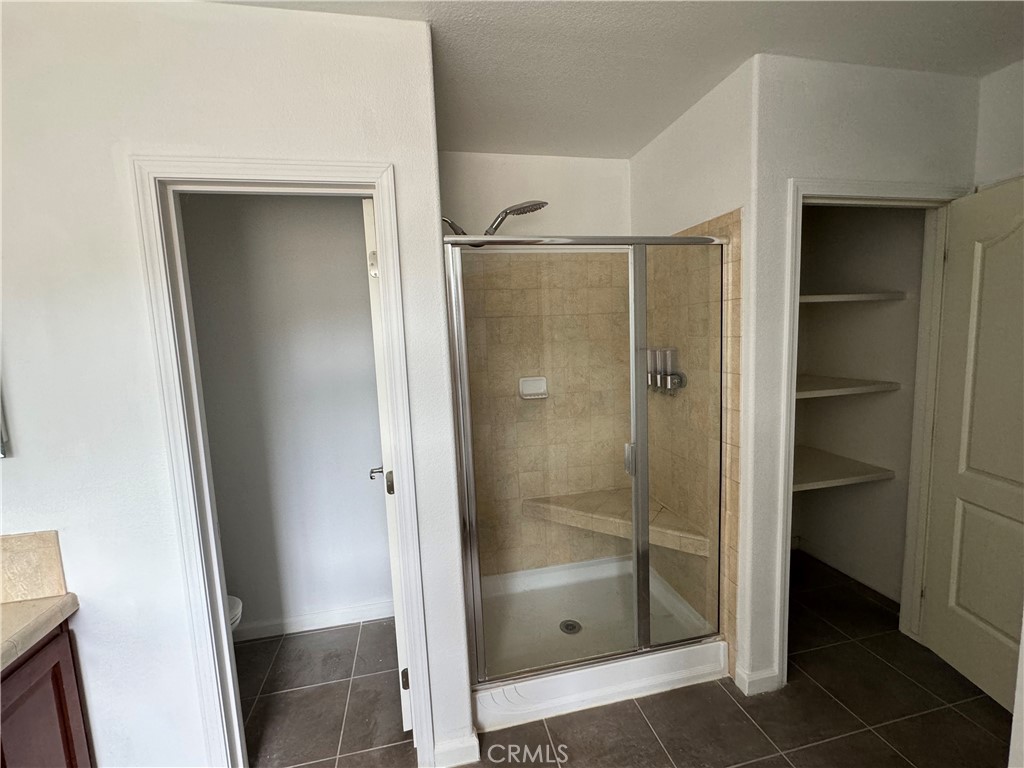 57725 Ramsey Road Anza, CA 92539 - Photo 27 of 43 a bathroom with a shower and a sink