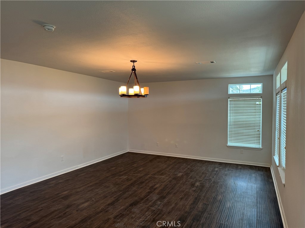 57725 Ramsey Road Anza, CA 92539 - Photo 3 of 43 wooden floor in an empty room with a window