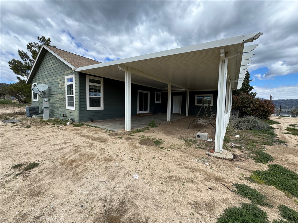 57725 Ramsey Road Anza, CA 92539 - Photo 38 of 43 front view of a house with a yard