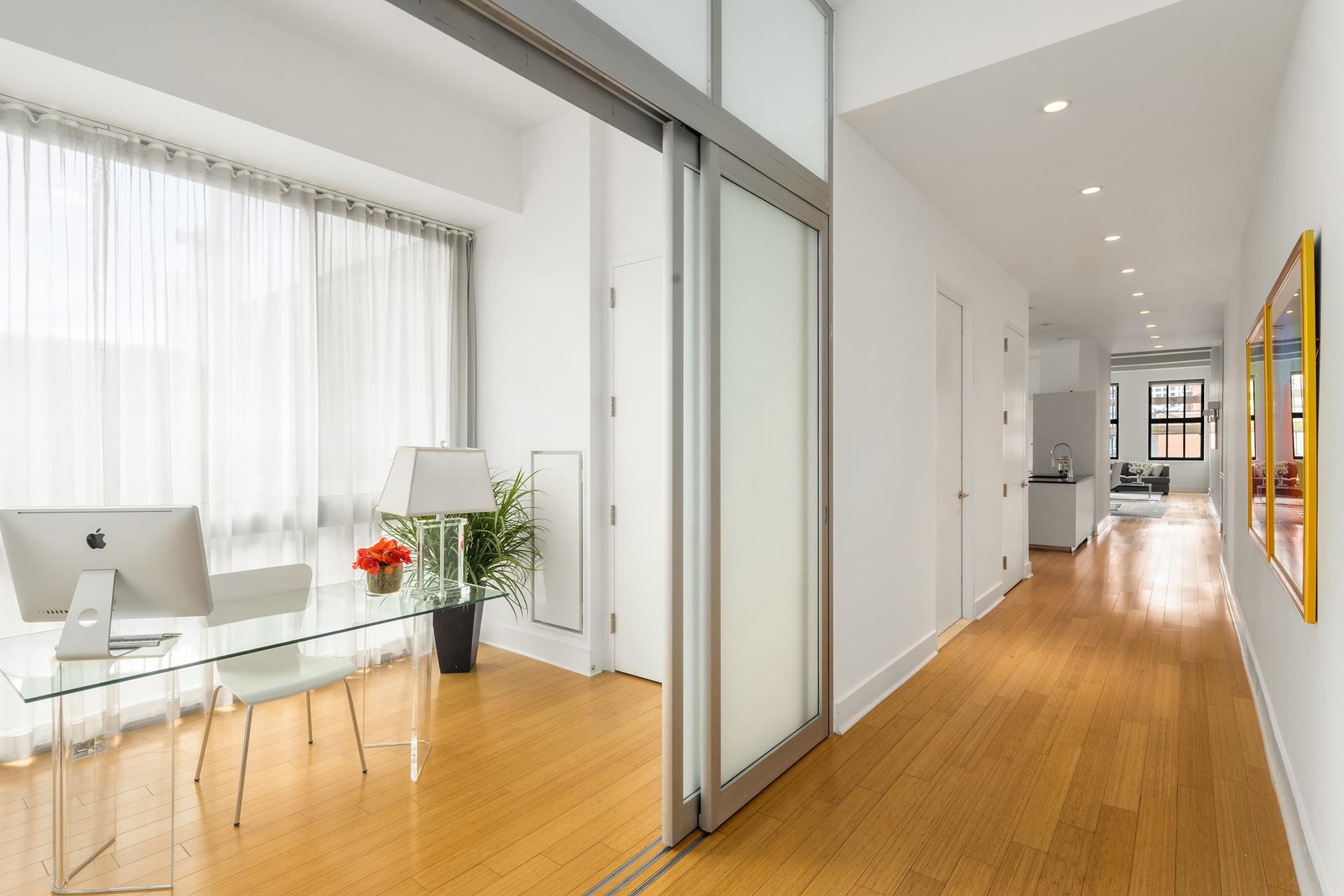a view of a living room and a kitchen