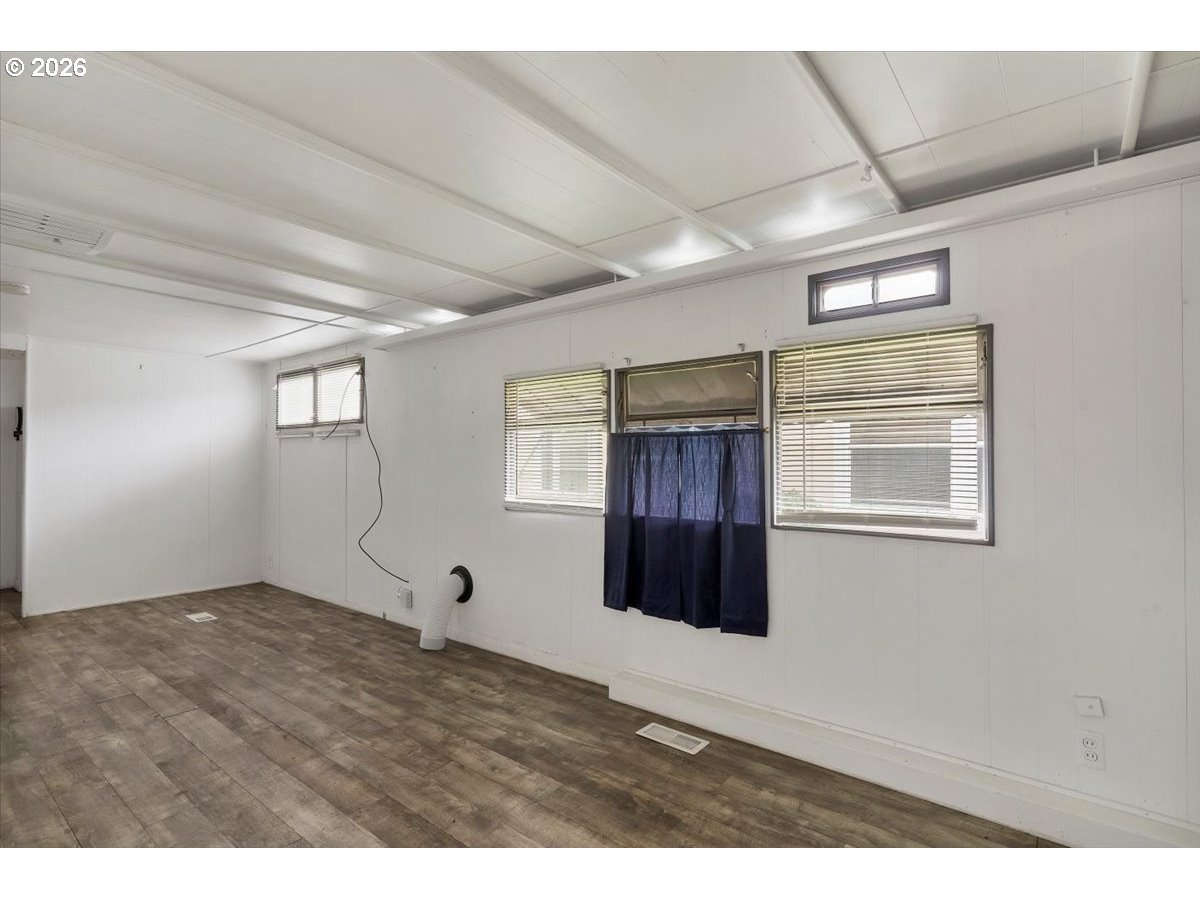 5422 Portland Road Northeast, Unit 10 Salem, OR 97305 - Photo 7 of 25 a view of empty room with windows