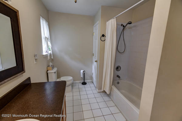 21 Paint Island Spring Road Millstone Township, NJ 08510 - Photo 22 of 27 a bathroom with a bathtub and a shower