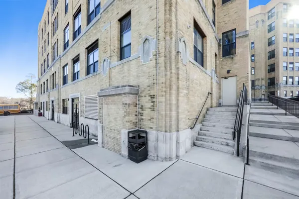 a view of a pathway along a building