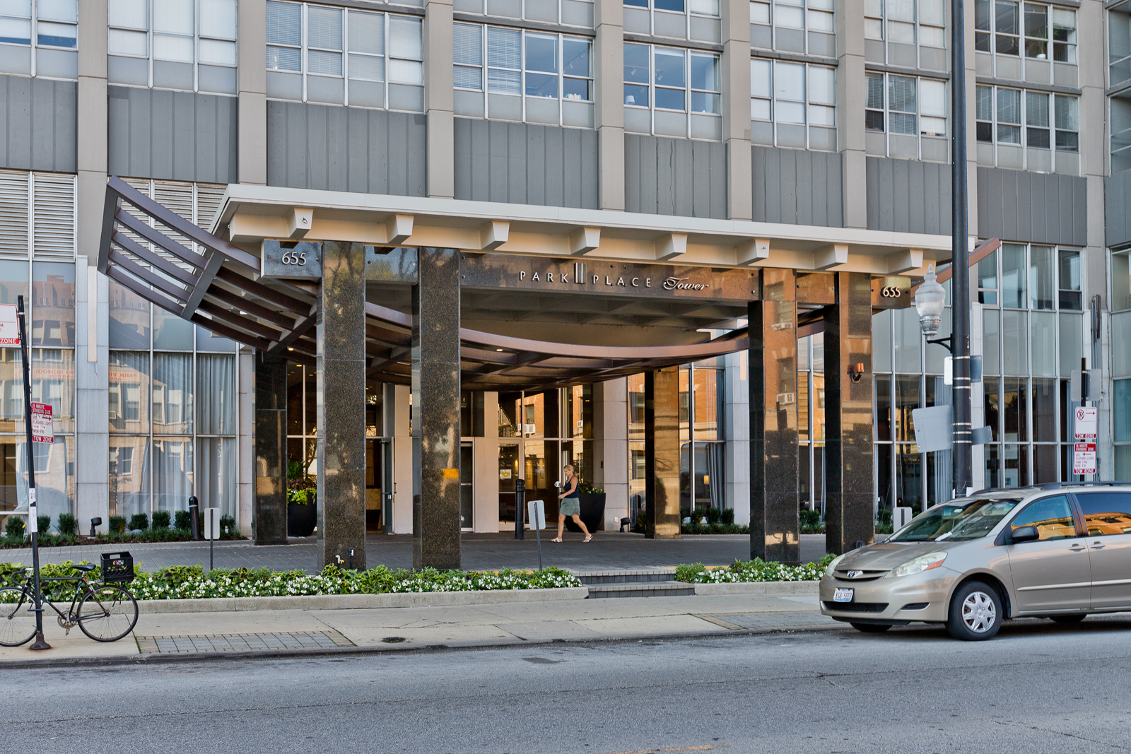 655 West Irving Park Road, Unit 4008 Chicago, IL 60613 - Photo 1 of 16 a car parked in front of a building