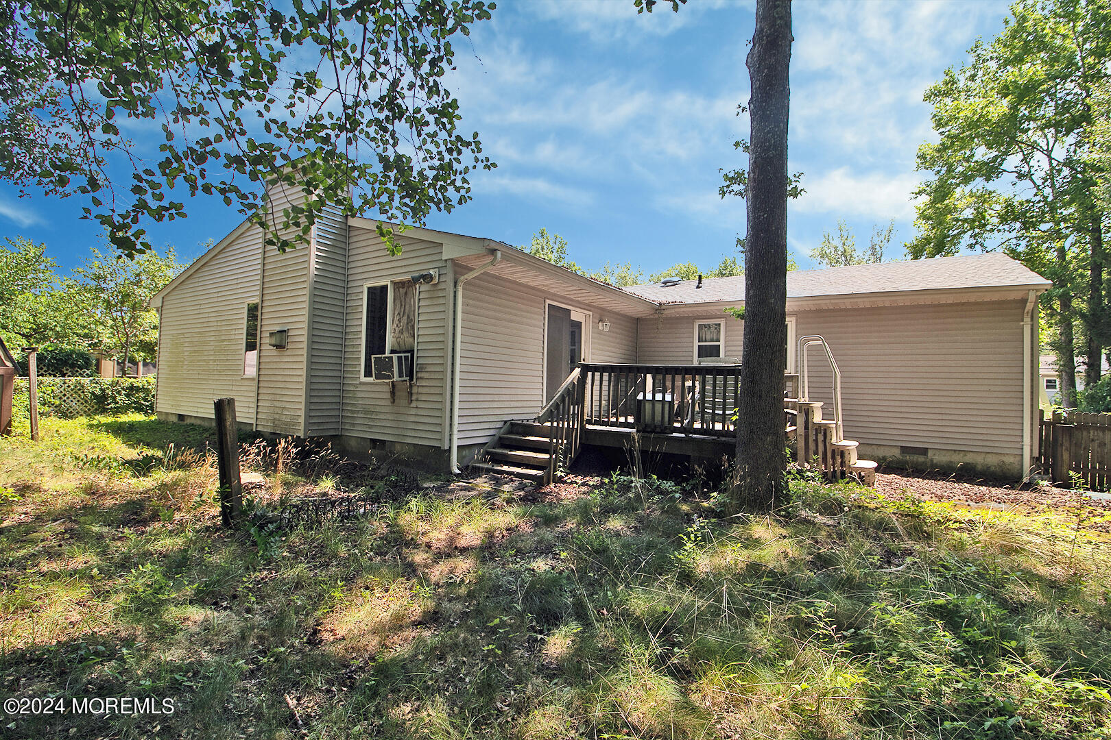 27 Barnegat Beach Drive Waretown, NJ 08758 - Photo 23 of 23 a backyard of a house with table and chairs