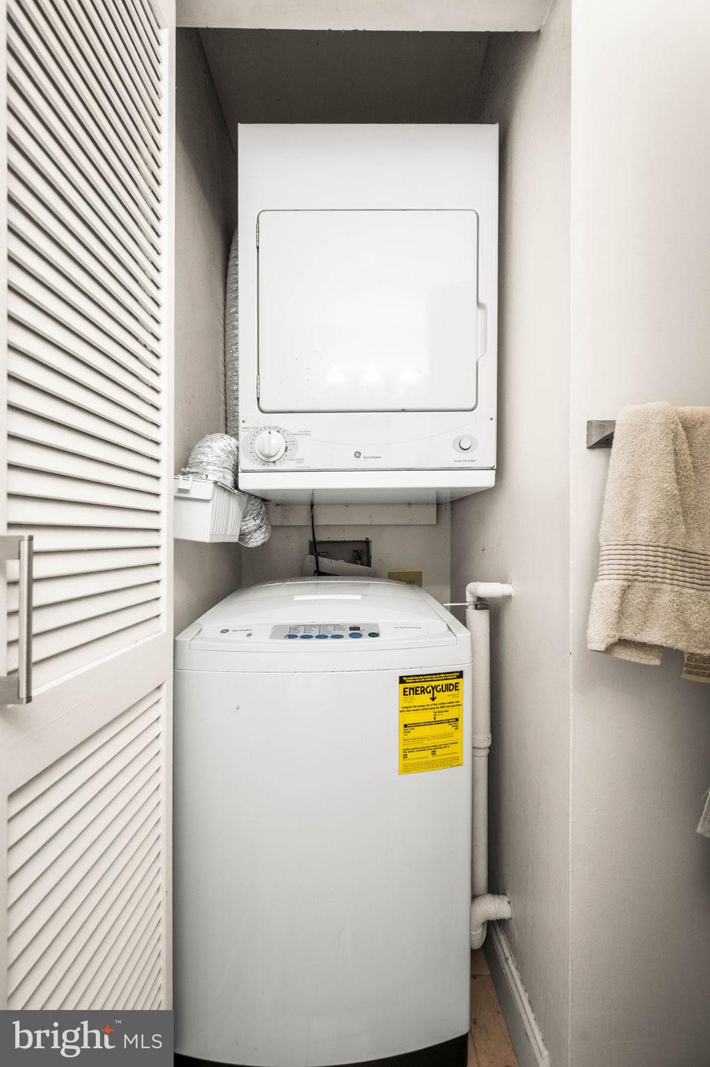 2429 Locust Street, Unit 409 Philadelphia, PA 19103 - Photo 14 of 25 a utility room with dryer and washer