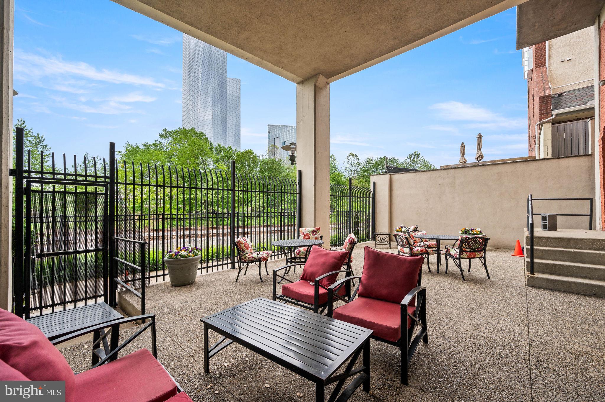 2429 Locust Street, Unit 409 Philadelphia, PA 19103 - Photo 21 of 25 a sitting area with furniture and city view