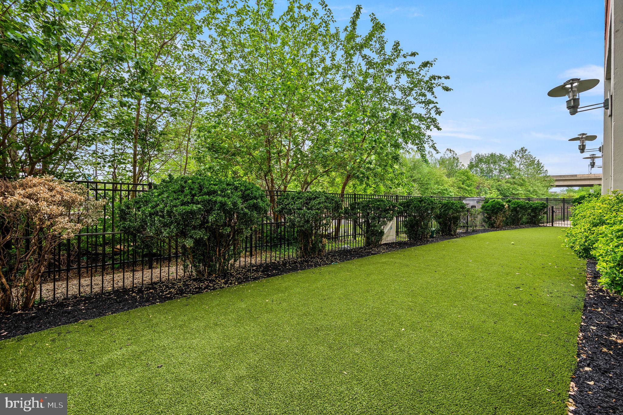 2429 Locust Street, Unit 409 Philadelphia, PA 19103 - Photo 22 of 25 a view of a garden with a trees