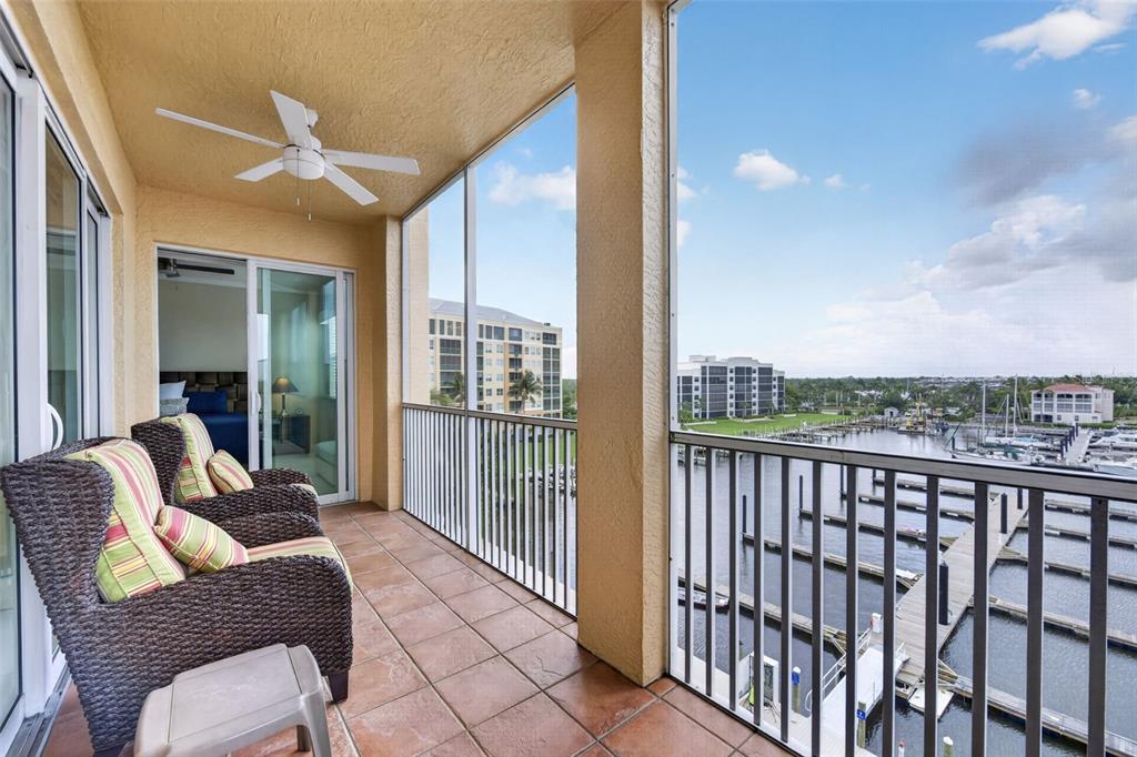 2060 Matecumbe Key Road, Unit 2506 Punta Gorda, FL 33955 - Photo 26 of 38 a balcony with furniture and city view