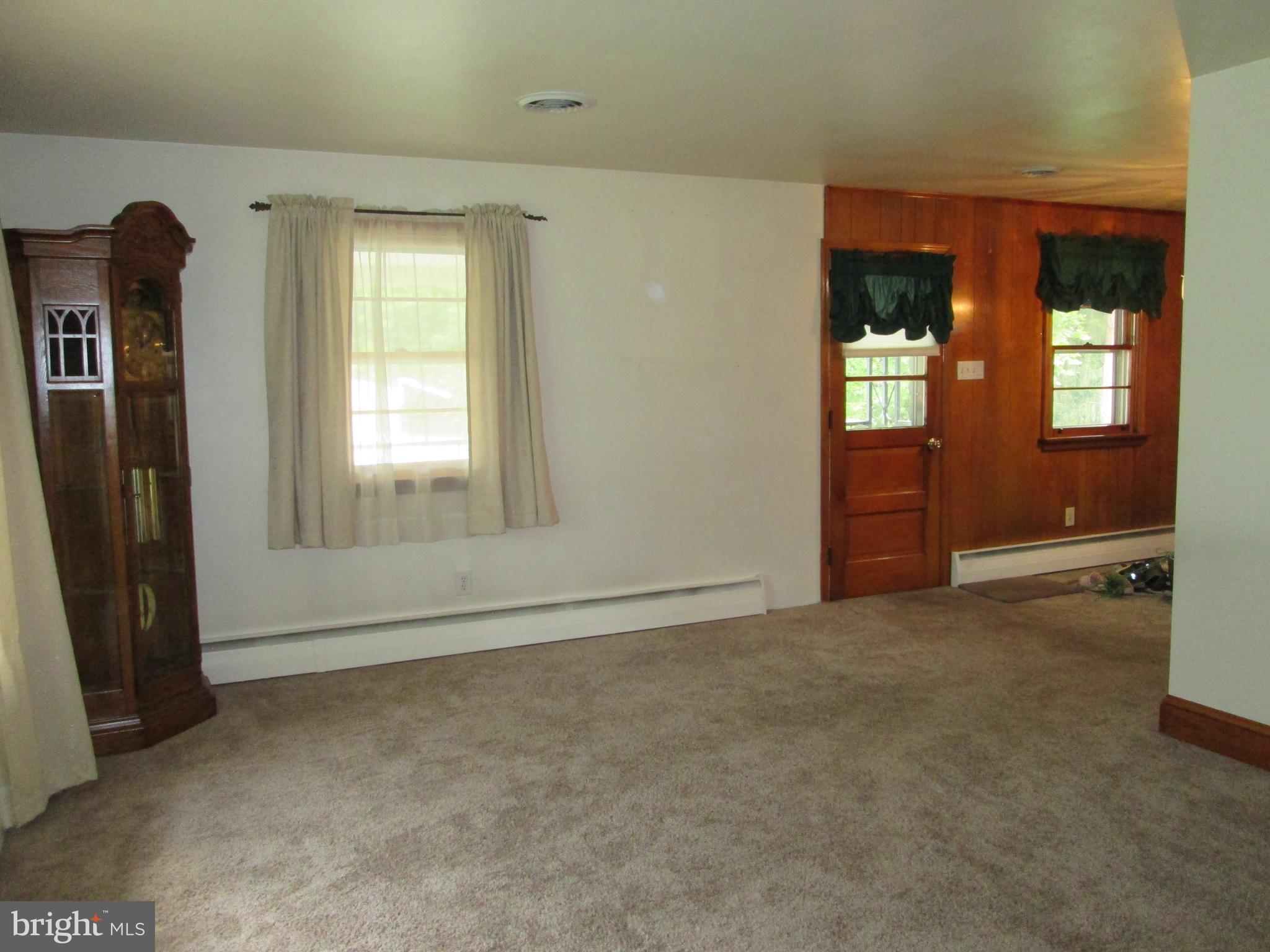71 Woodchoppertown Road Boyertown, PA 19512 - Photo 14 of 31 an empty room with windows and closet