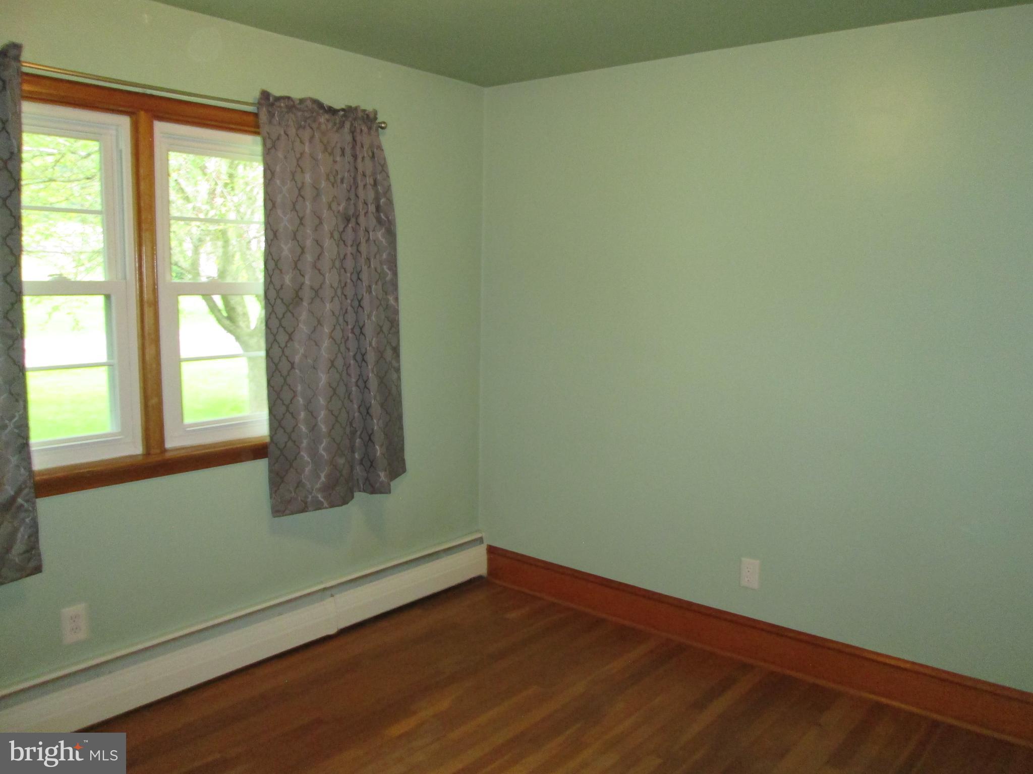 71 Woodchoppertown Road Boyertown, PA 19512 - Photo 27 of 31 a view of a small space with wooden floor and a window