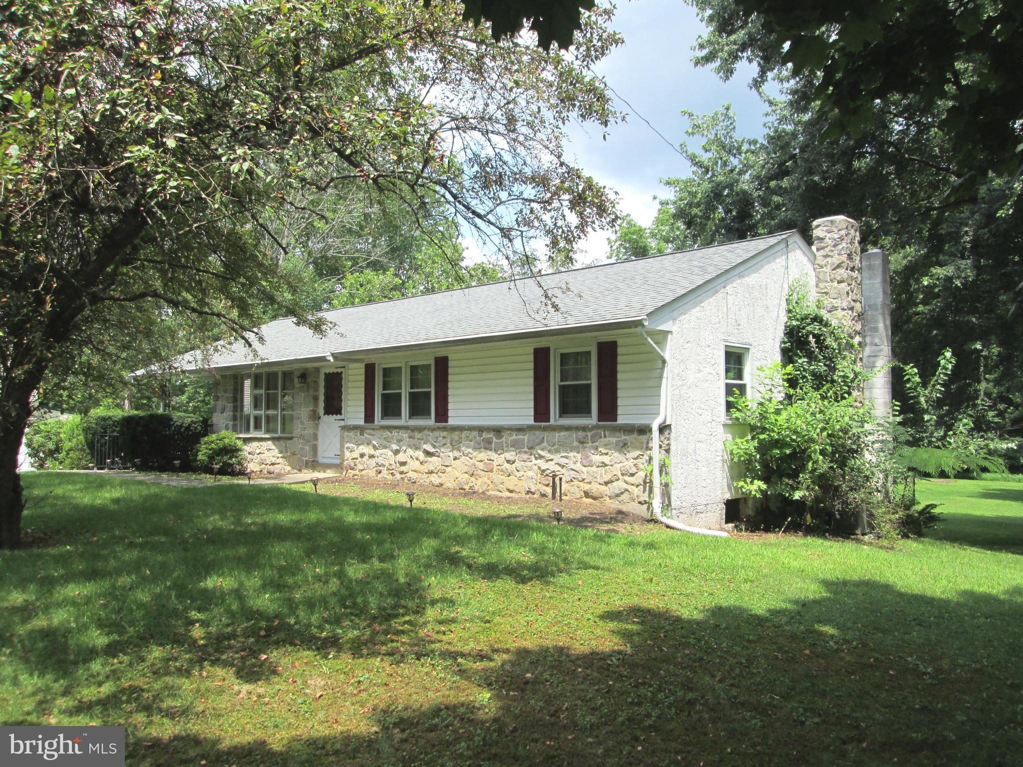 71 Woodchoppertown Road Boyertown, PA 19512 - Photo 3 of 31 a front view of house with yard and green space
