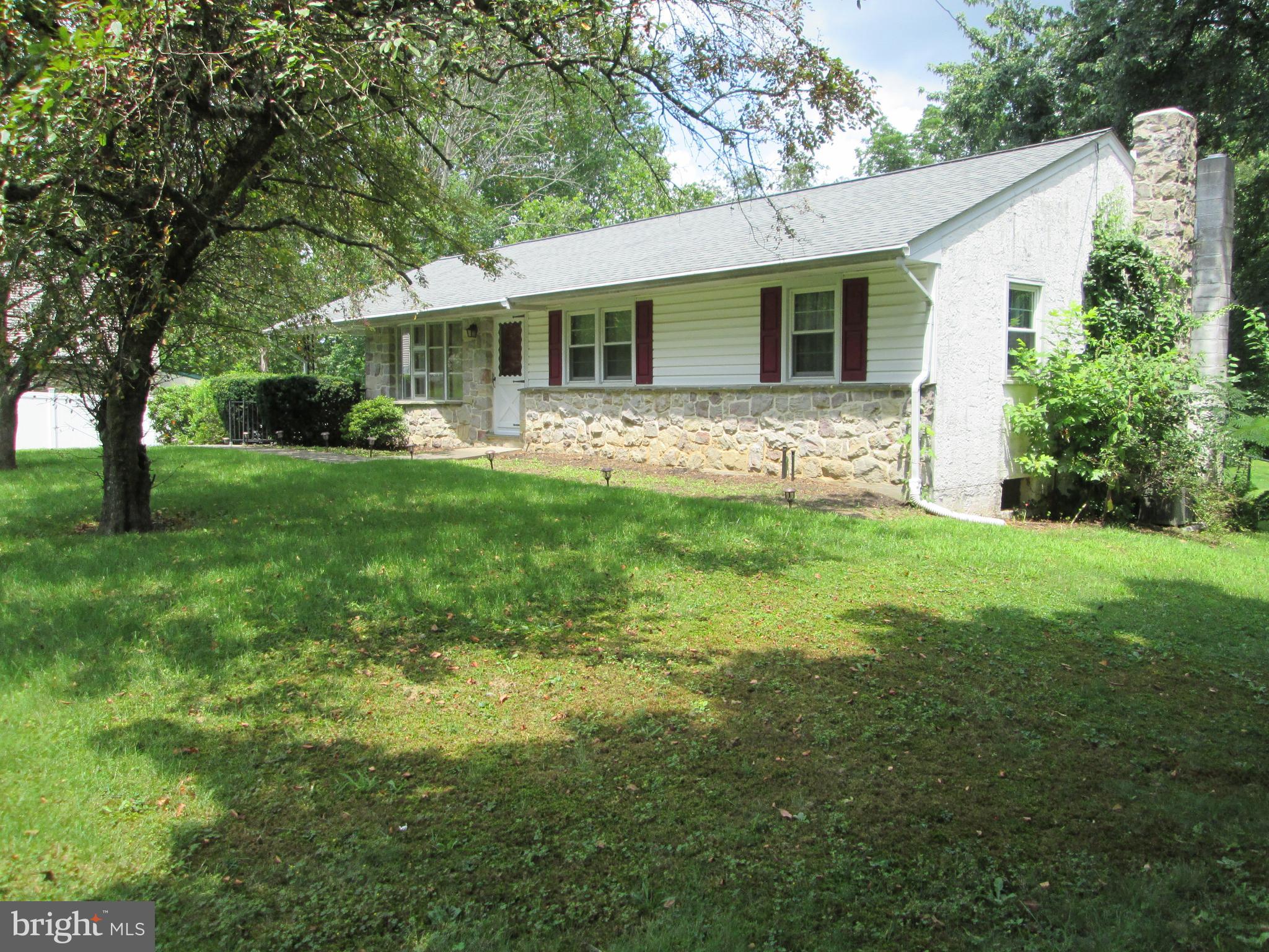 71 Woodchoppertown Road Boyertown, PA 19512 - Photo 4 of 31 a front view of house with yard and green space