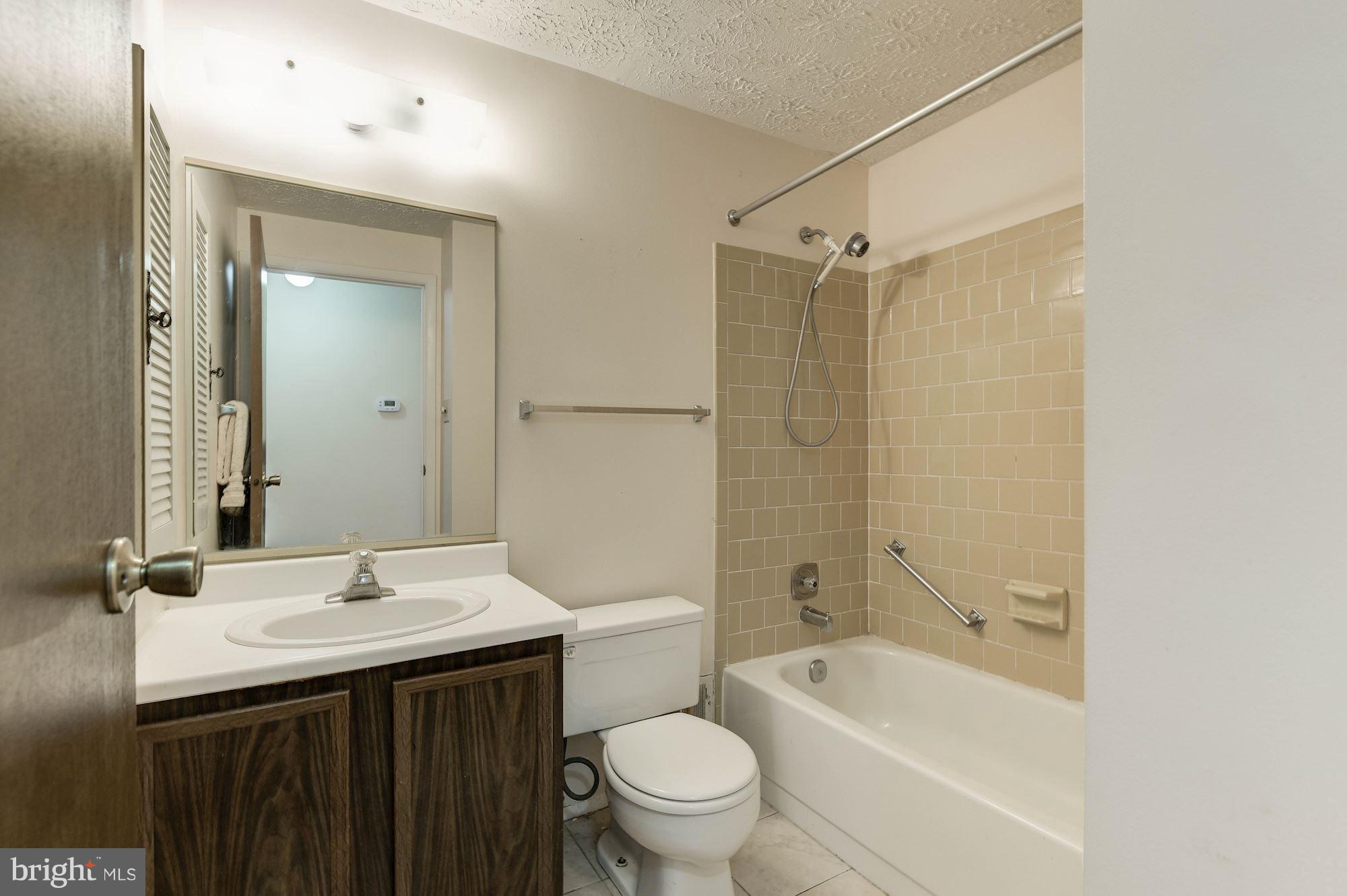 8334 Magic Leaf Road Springfield, VA 22153 - Photo 19 of 29 Upstairs full bath shared by bedrooms 2 and 3