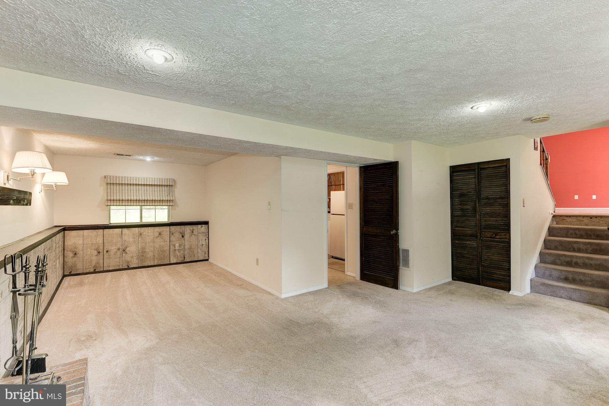 8334 Magic Leaf Road Springfield, VA 22153 - Photo 21 of 29 Finished Basement with new carpet