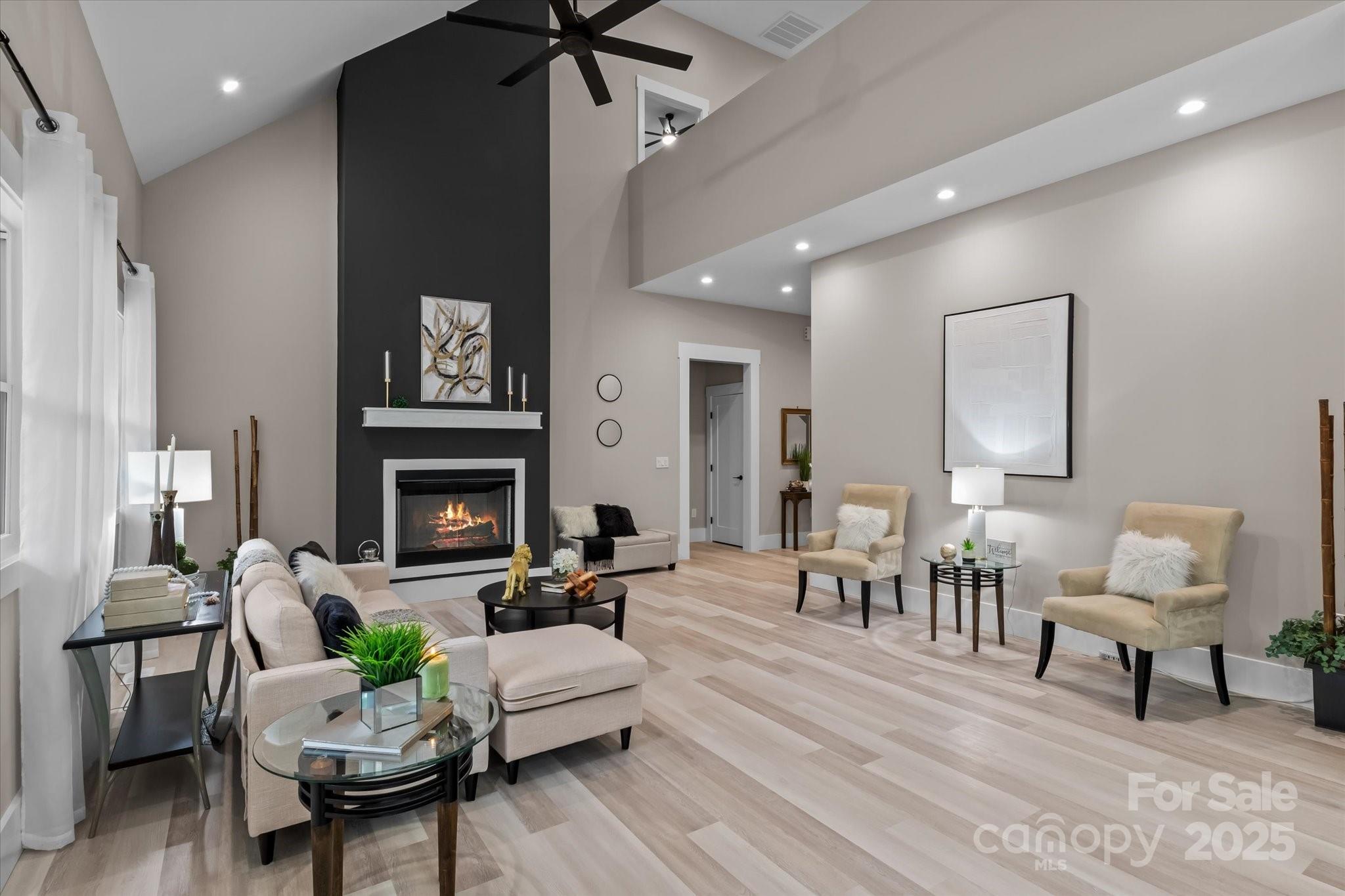 4435 Cornett Drive Iron Station, NC 28080 - Photo 1 of 46 a living room with furniture and a fireplace