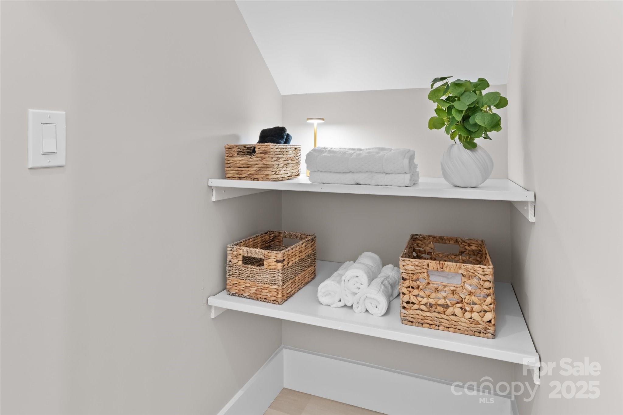 4435 Cornett Drive Iron Station, NC 28080 - Photo 20 of 46 a vase of flowers sitting on a shelf