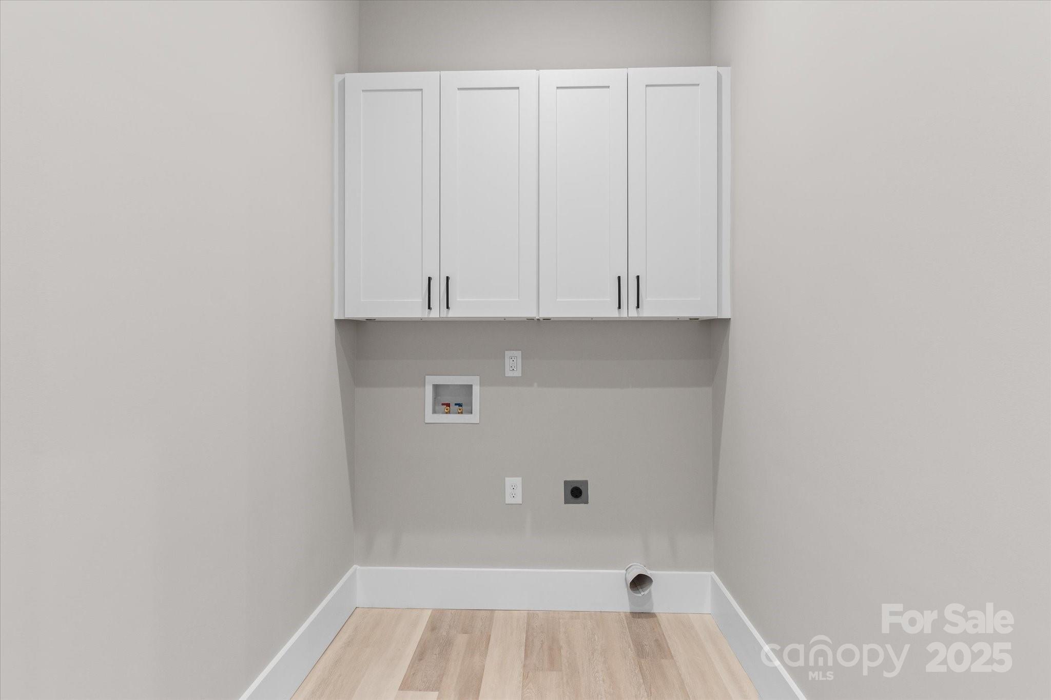 4435 Cornett Drive Iron Station, NC 28080 - Photo 40 of 46 a view of walk in closet with empty racks