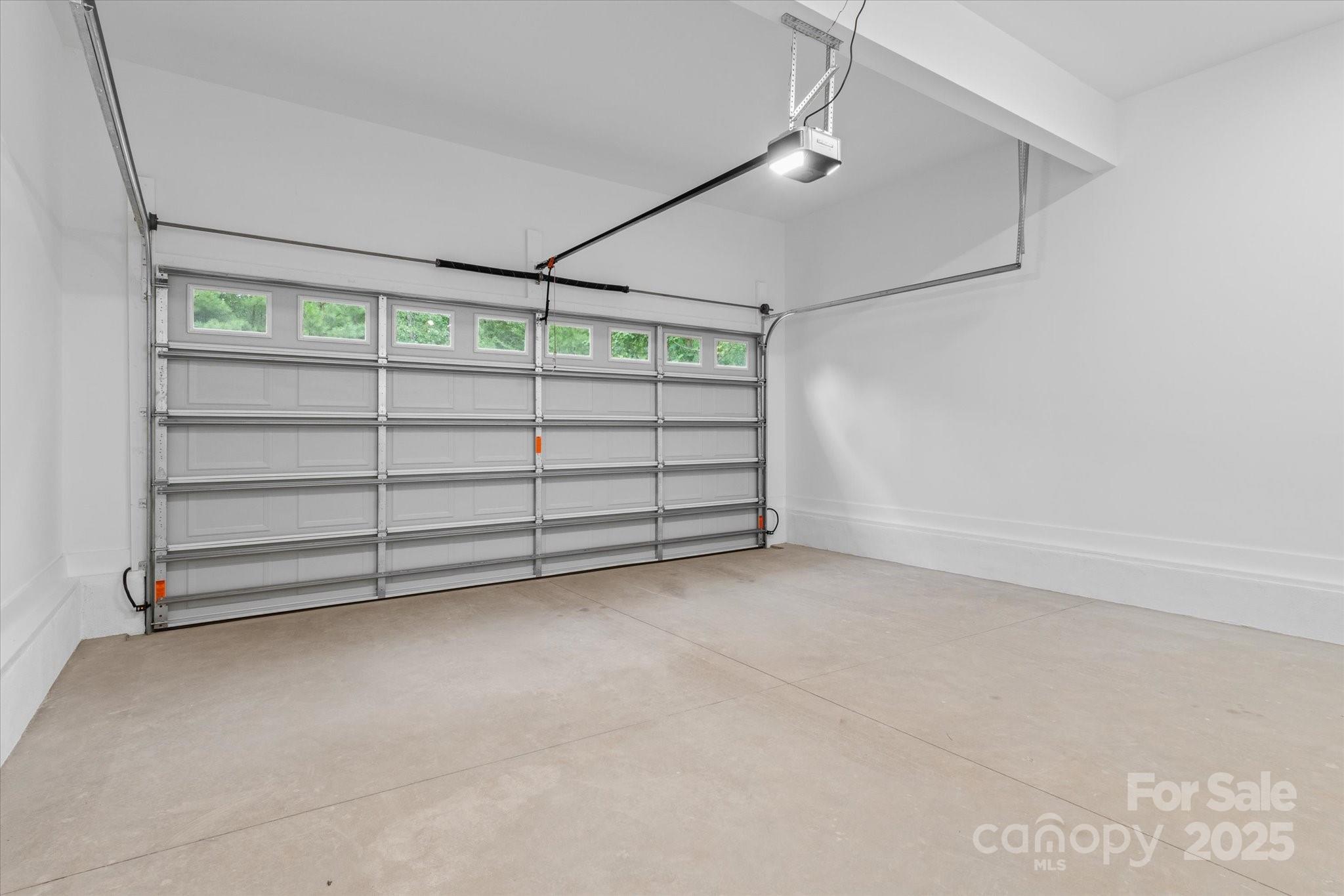 4435 Cornett Drive Iron Station, NC 28080 - Photo 41 of 46 a view of room with balcony and a ceiling fan