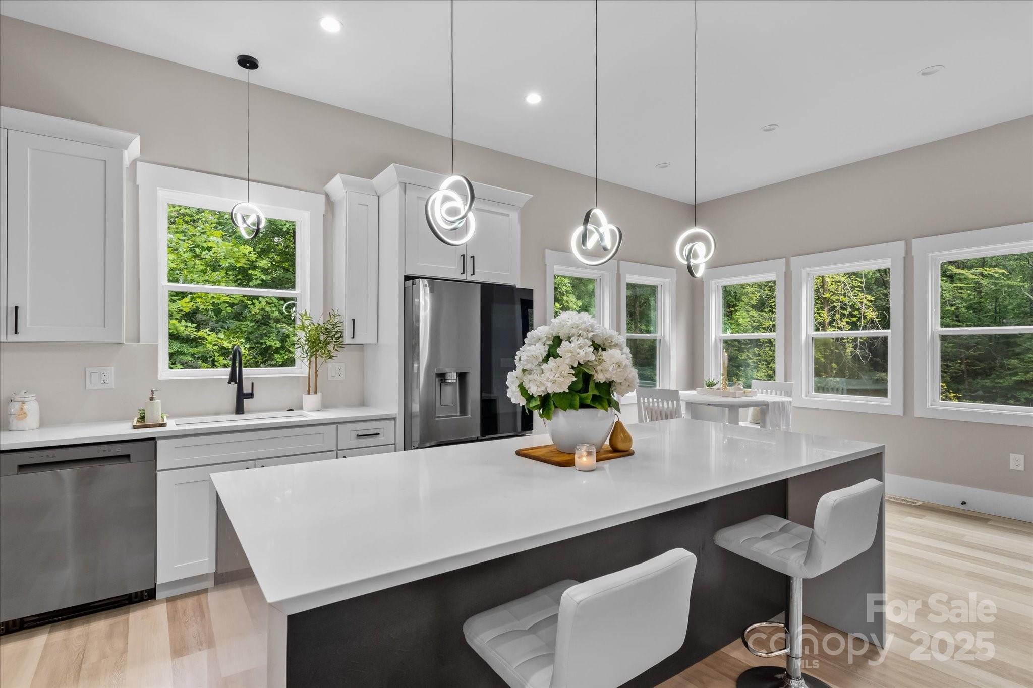 4435 Cornett Drive Iron Station, NC 28080 - Photo 9 of 46 a kitchen with a table chairs and window