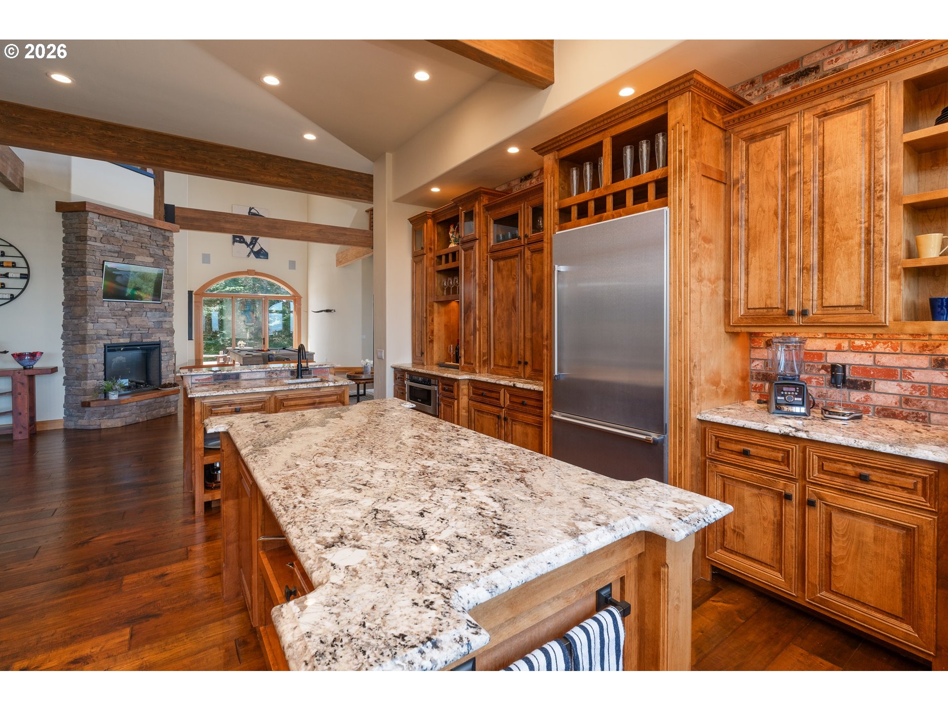 94880 Grizzly Mountain Road Gold Beach, OR 97444 - Photo 18 of 48 a kitchen with stainless steel appliances granite countertop a sink stove and refrigerator