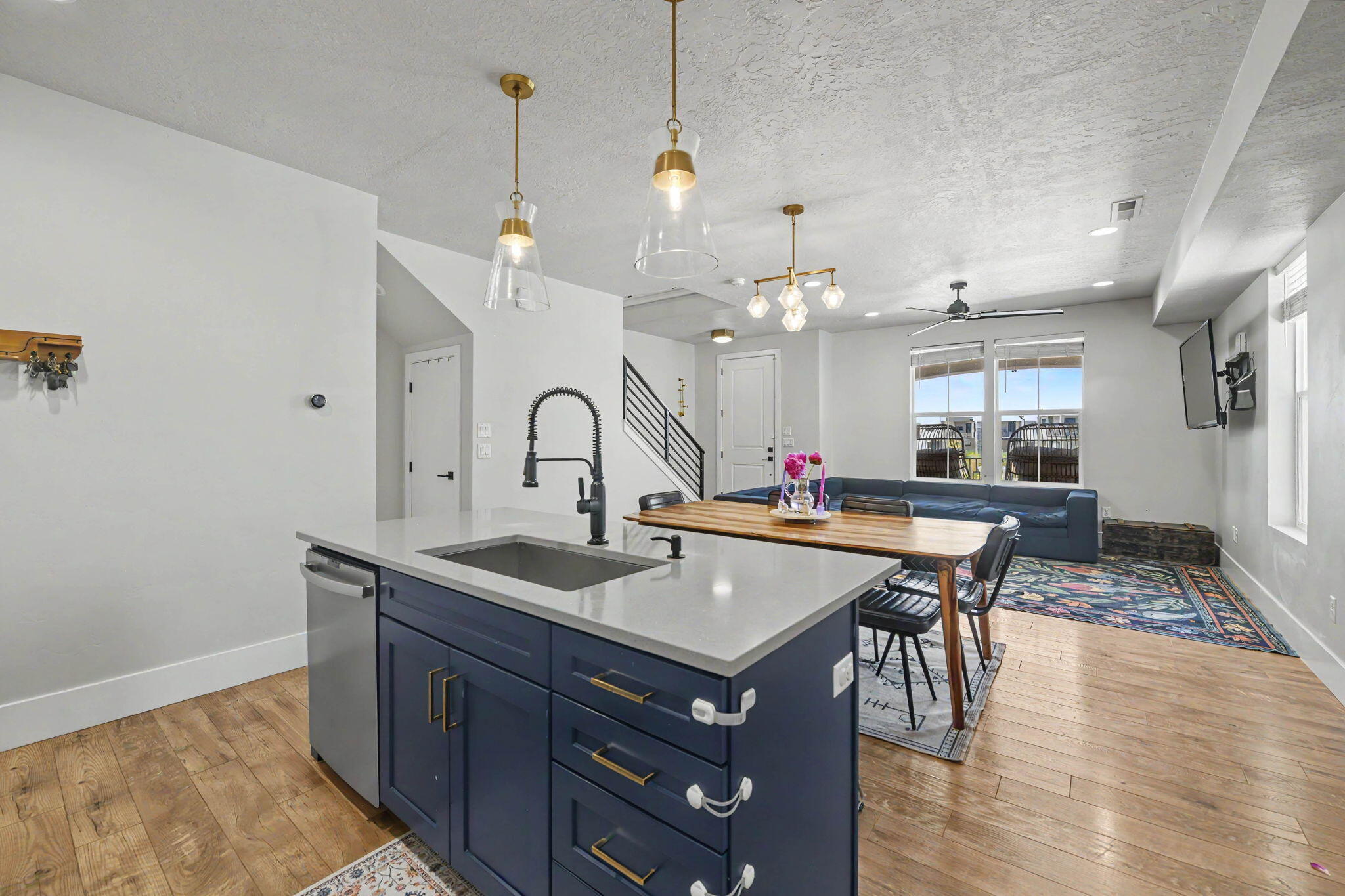 744 West Sunfire Lane St. George, UT 84790 - Photo 7 of 56 Kitchen island to living room