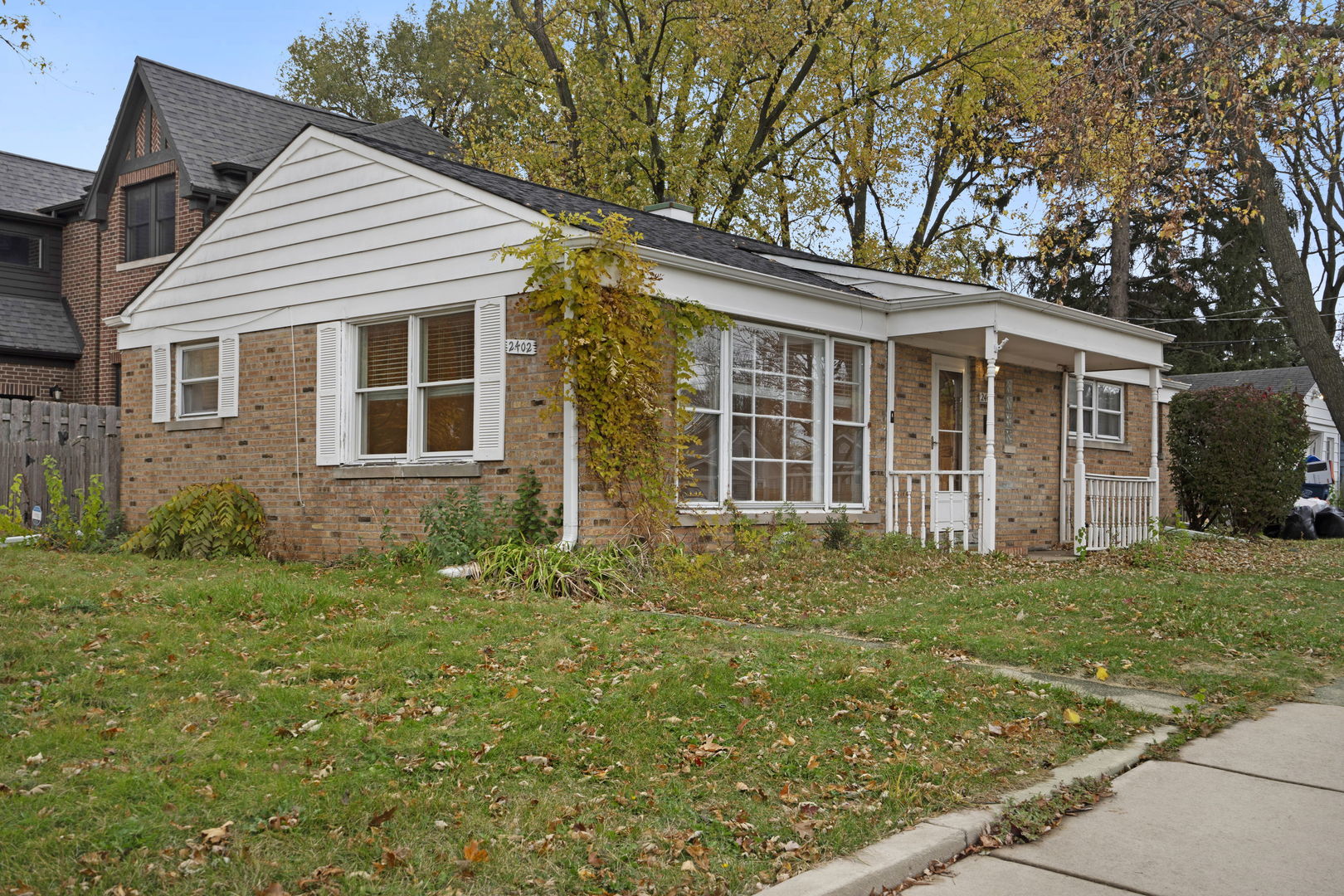 2402 Illinois Road Northbrook, IL 60062 - Photo 2 of 9 front view of a house with a yard