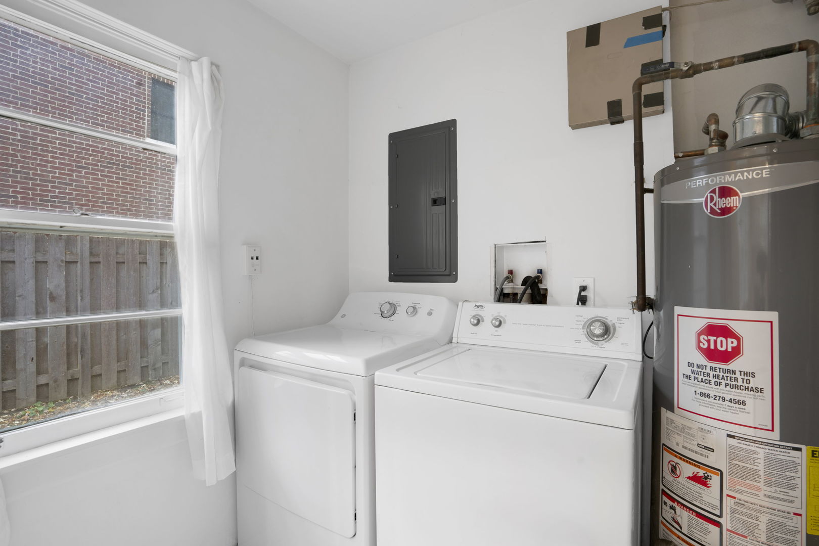 2402 Illinois Road Northbrook, IL 60062 - Photo 9 of 9 a utility room with dryer and washer