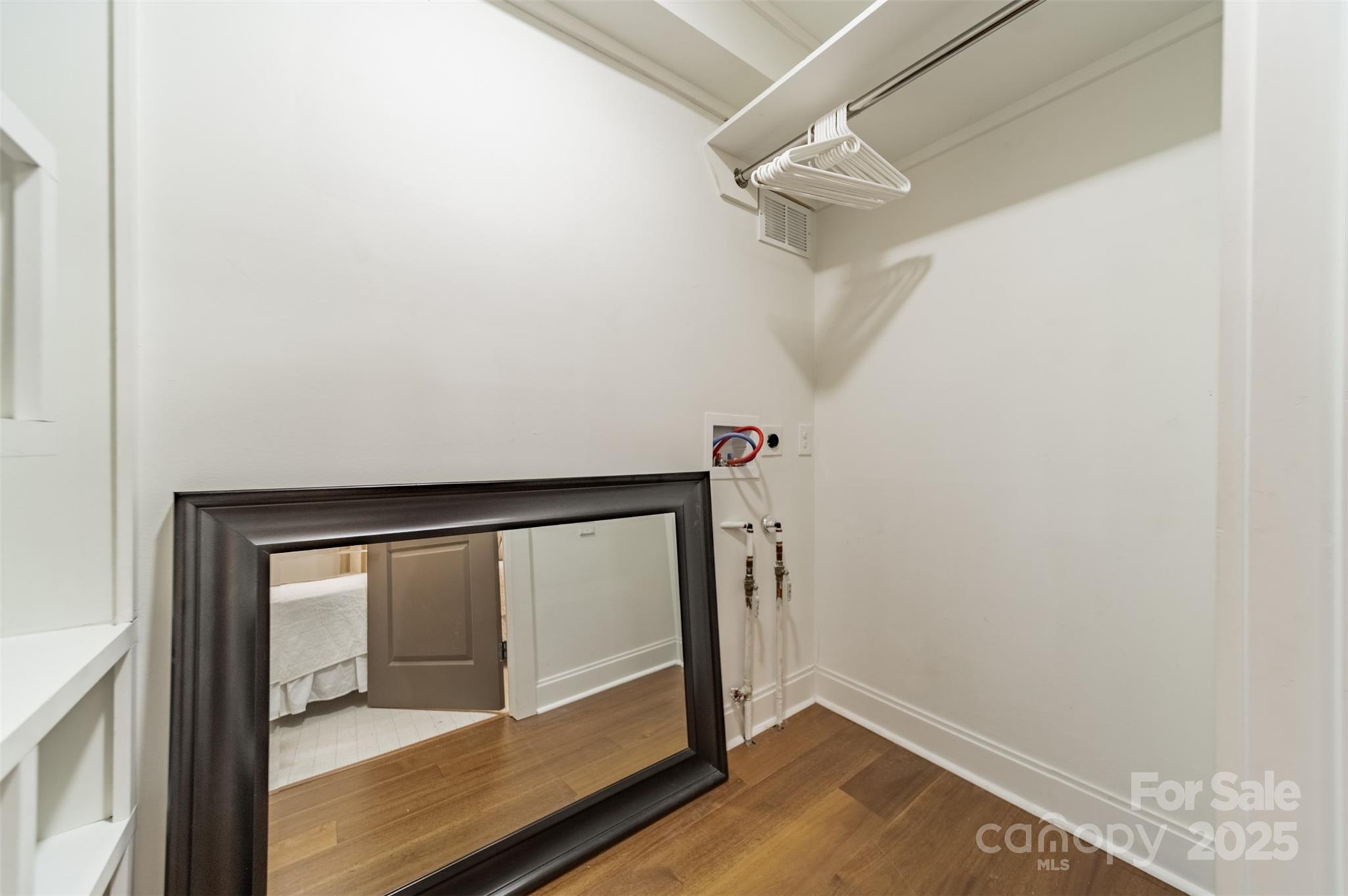 400 Queens Road, Unit D6 Charlotte, NC 28207 - Photo 16 of 26 a view of an entryway with wooden floor