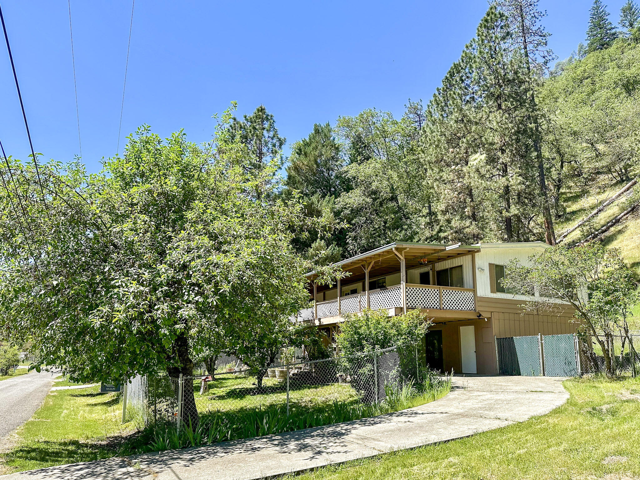 155 Steelhead Circle Lewiston, CA 96052 - Photo 40 of 53 a view of house with yard and trees in the background