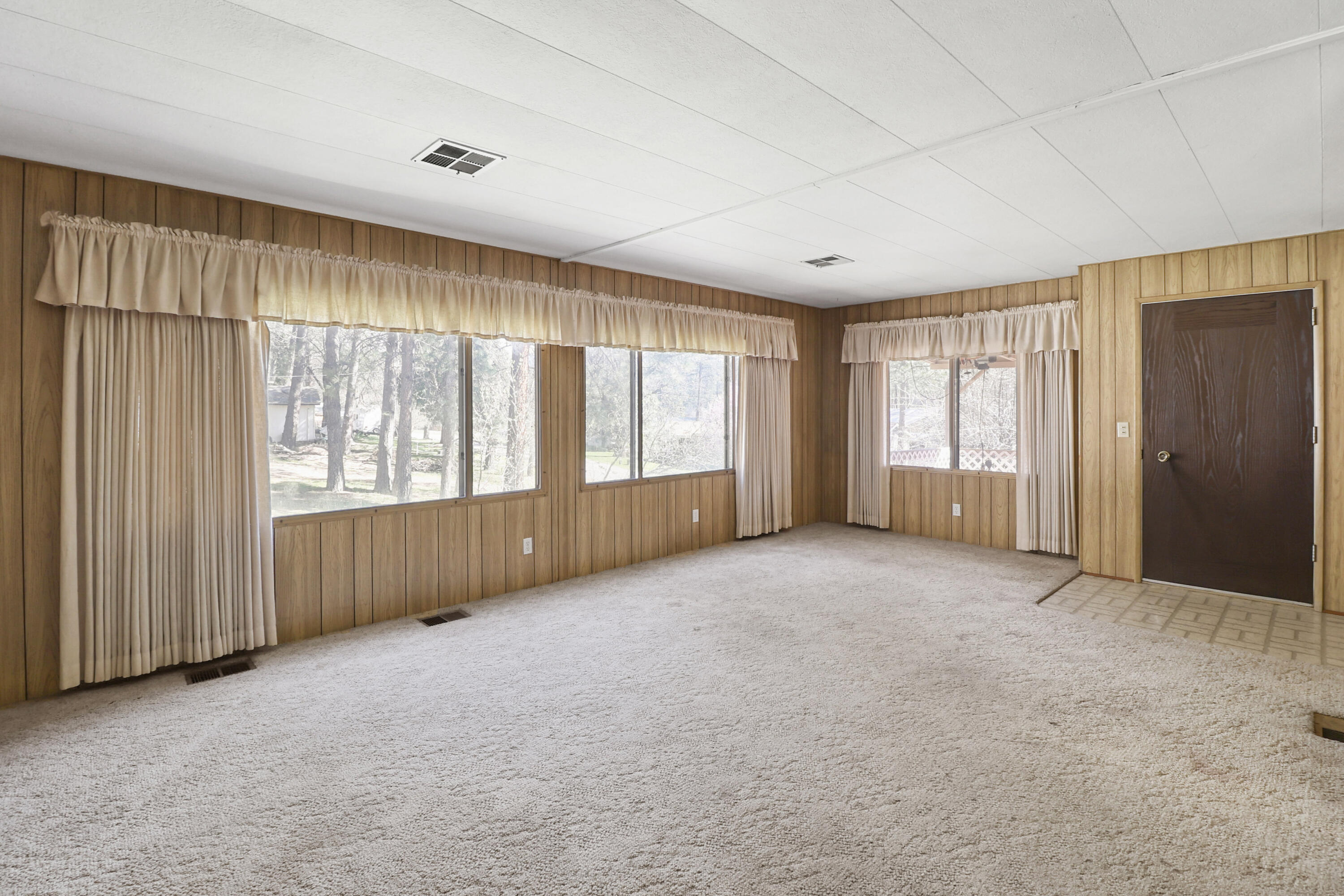 155 Steelhead Circle Lewiston, CA 96052 - Photo 5 of 53 a view of an empty room with a window