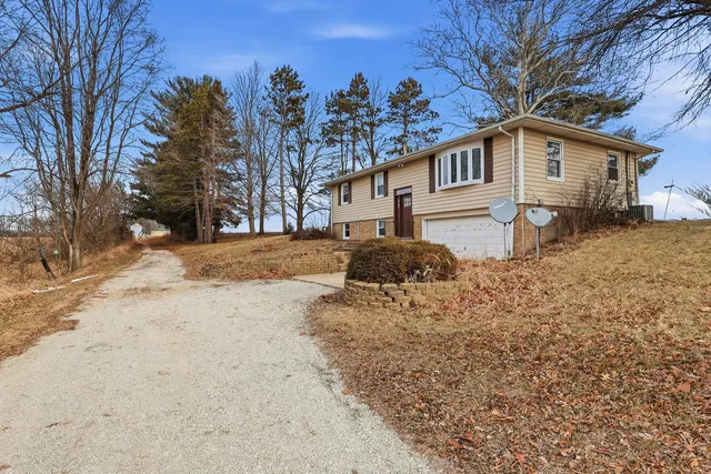 a view of outdoor space with wooden fence