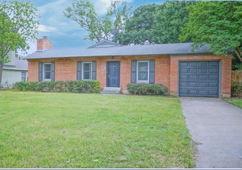3567 Dryden Road Fort Worth, TX 76109 - Photo 1 of 13 Ranch-style house featuring concrete driveway, a garage, a chimney, a front lawn, and brick siding