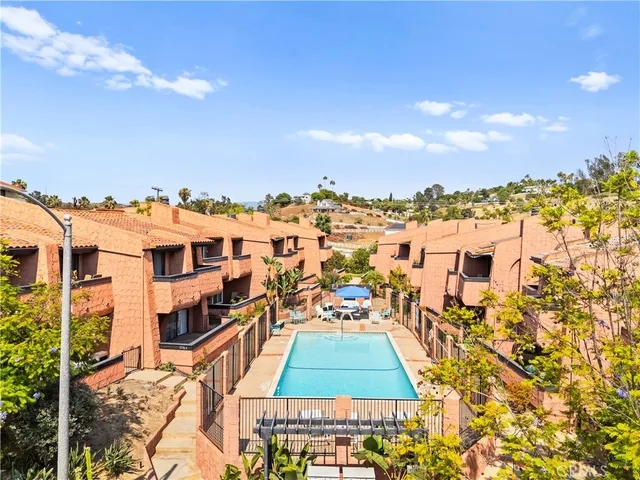 a view of a city with tall buildings