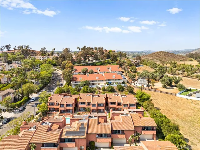 a street view with tall buildings